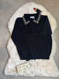 Pull noir à col chemise et motif floraux en strass